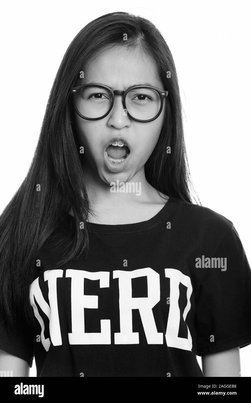 Close up of young Asian teenage nerd girl looking angry Stock Photo - Alamy