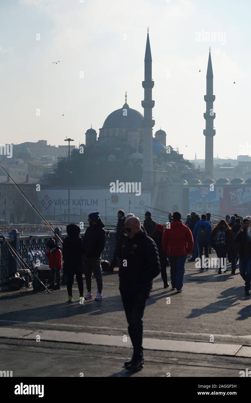 People fishing at Galata Bridge in a sunny day, Beyoglu, Istanbul, Turkey. Stock Photo