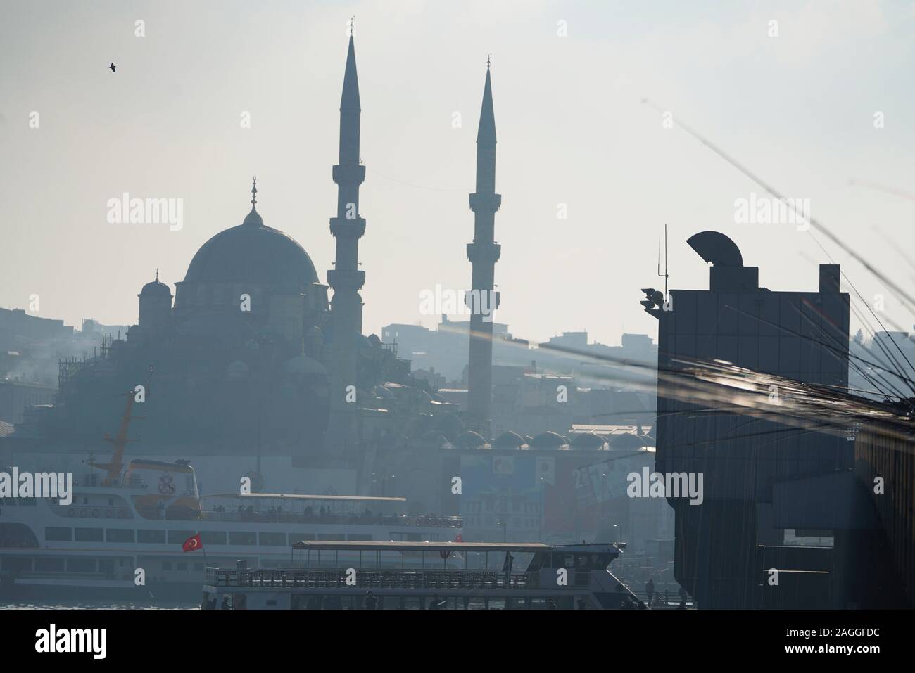 People fishing at Galata Bridge in a sunny day, Beyoglu, Istanbul, Turkey. Stock Photo