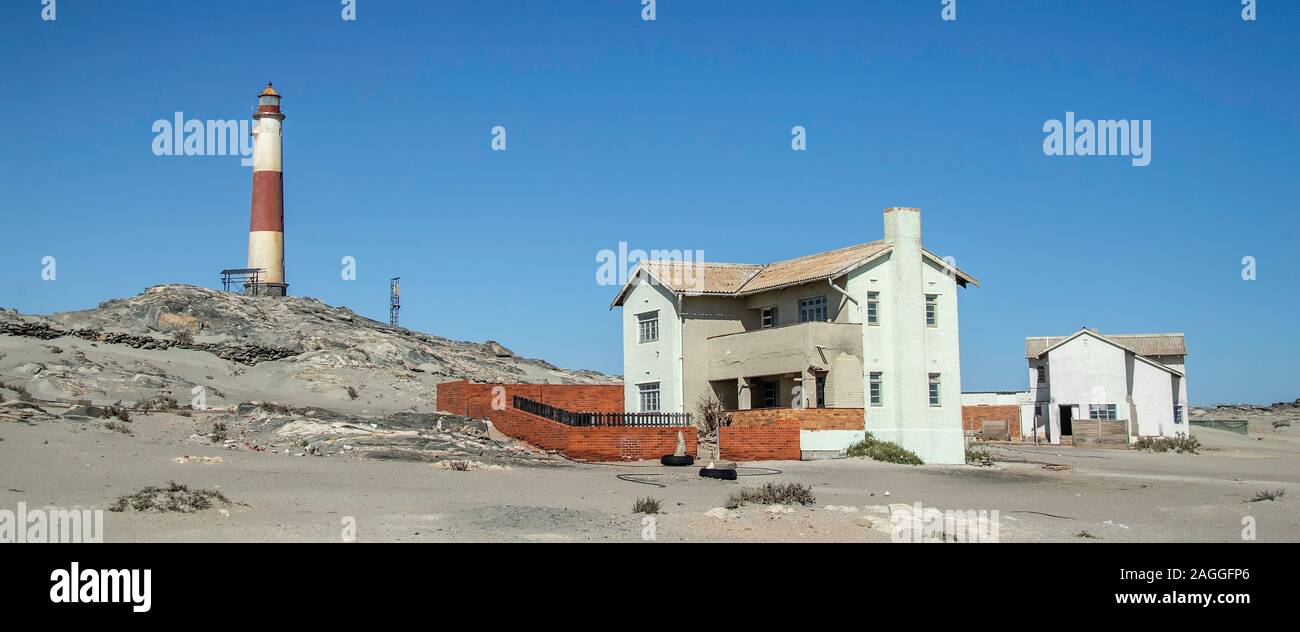 The lighthouse keeper's house on Diaz Point with the light in the background. Stock Photo