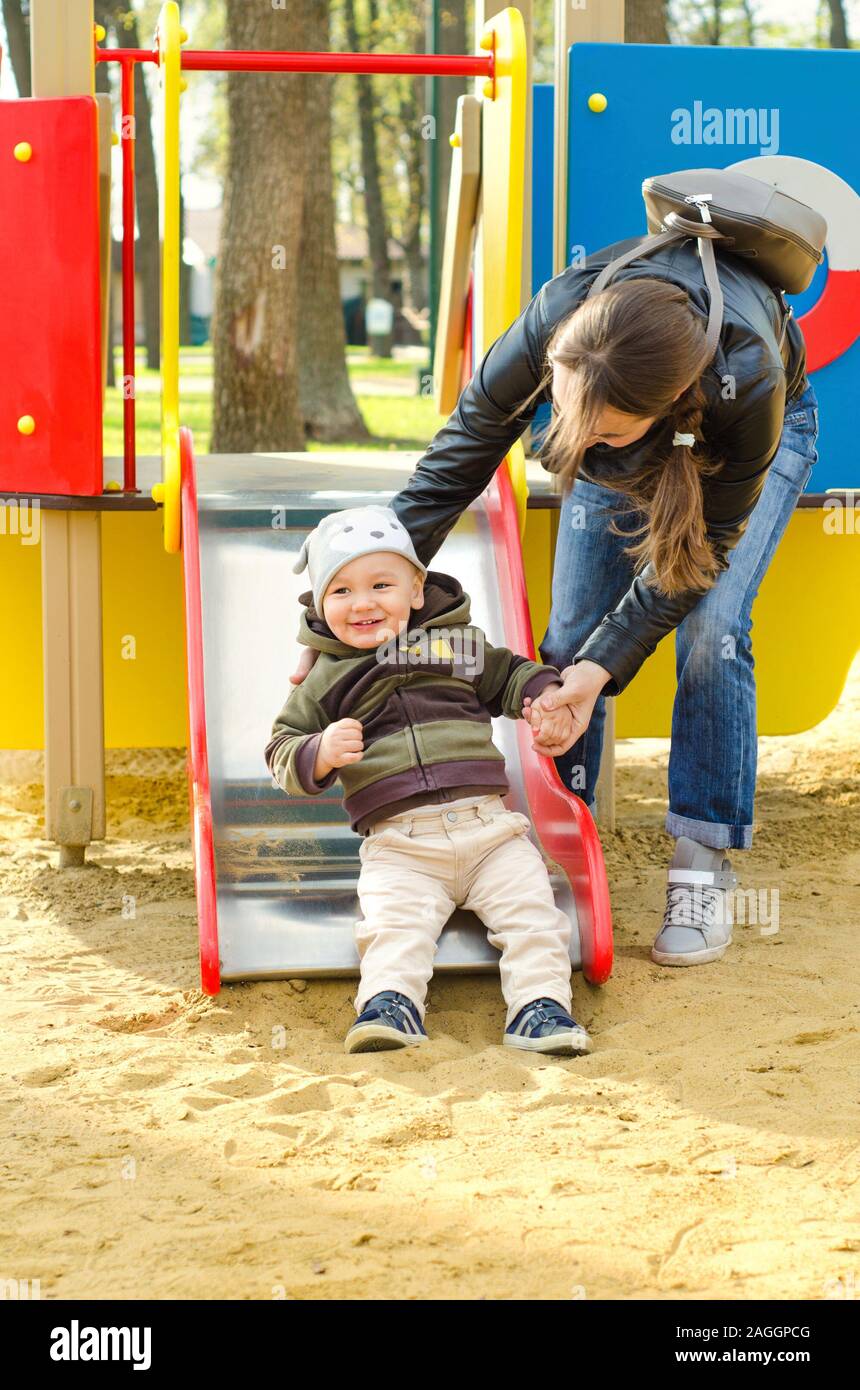 mother and baby at the playground Stock Photo - Alamy