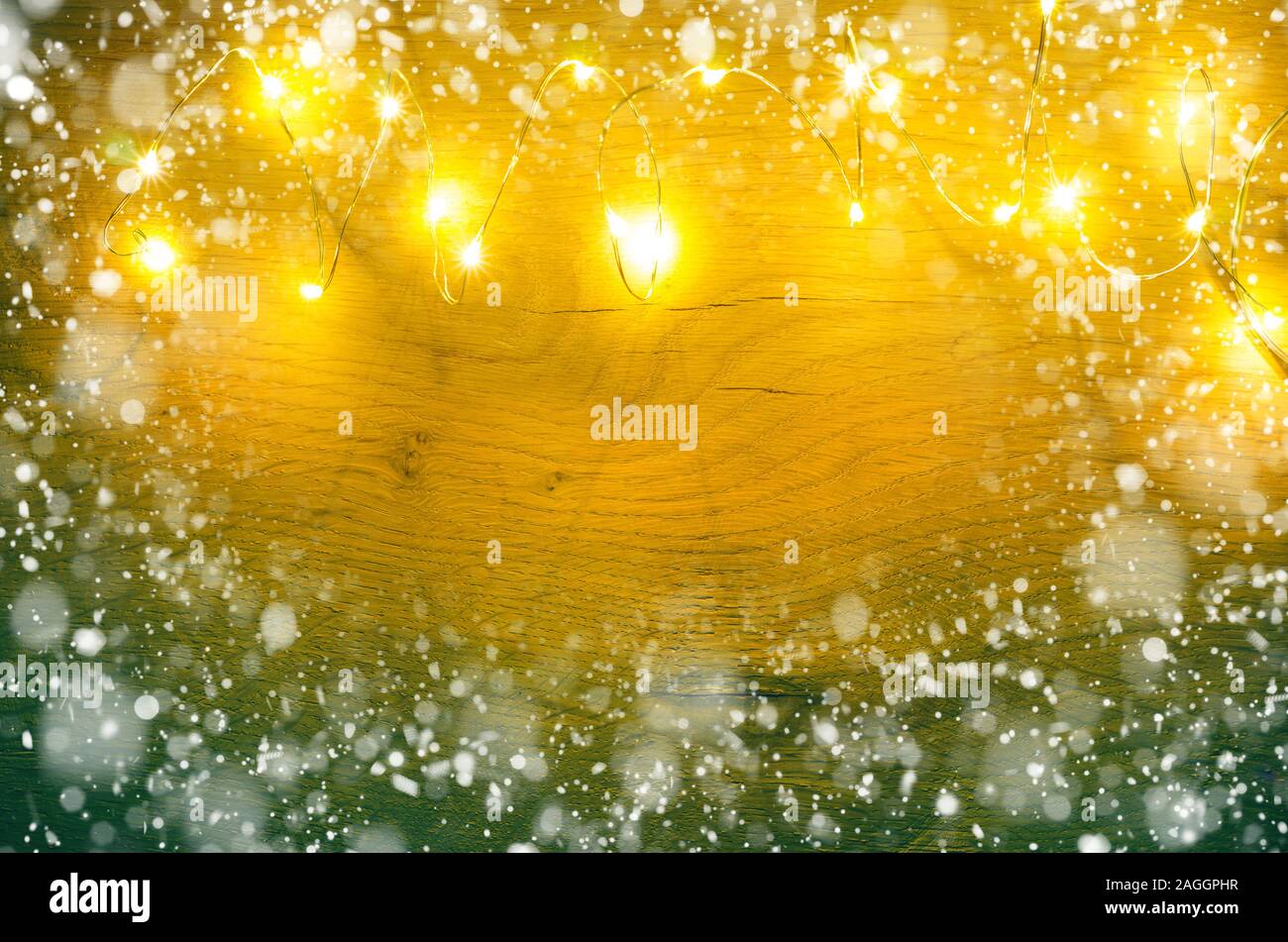 christmas background with garland light and snow Stock Photo Alamy