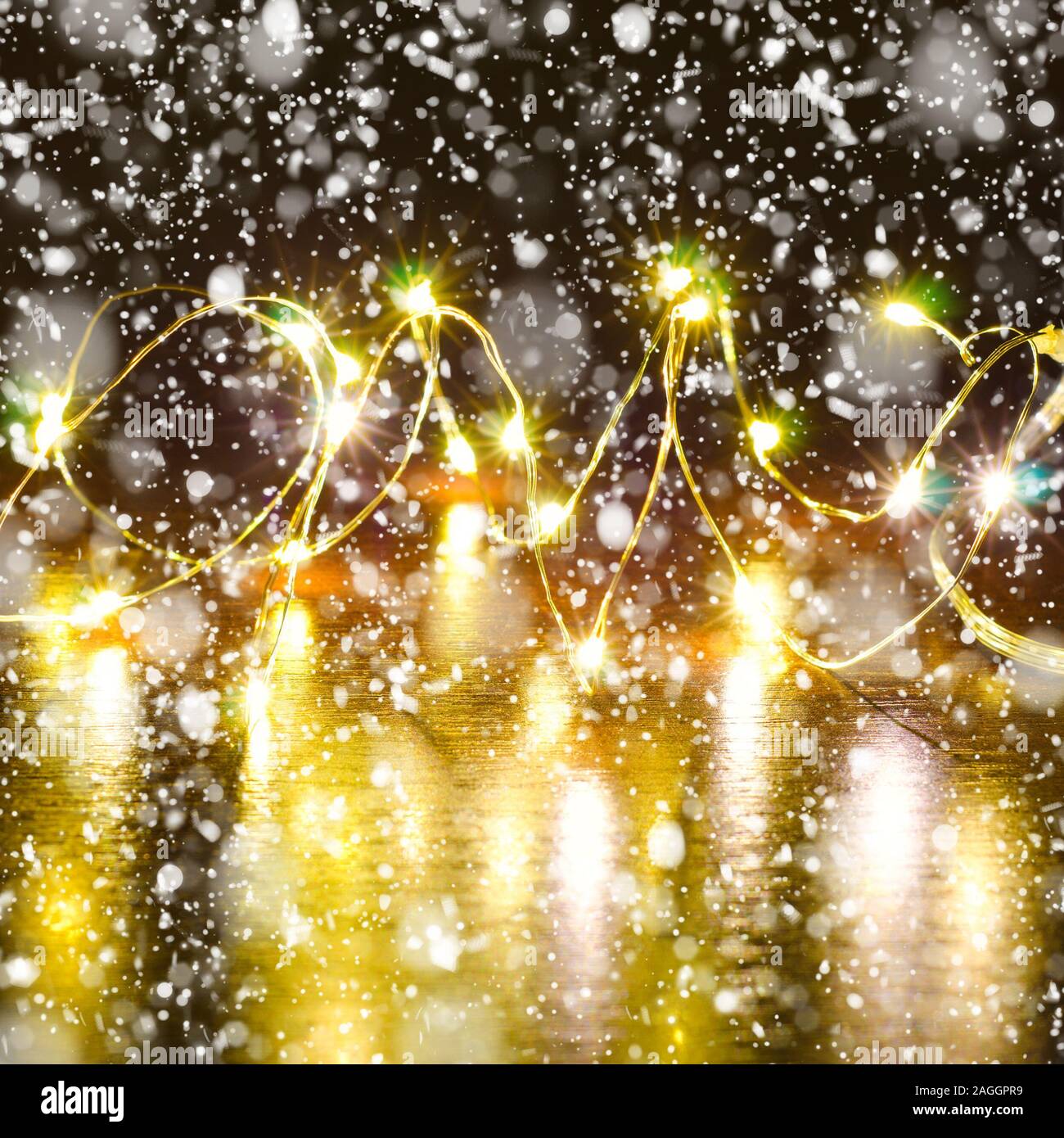 christmas background with garland light and snow Stock Photo Alamy