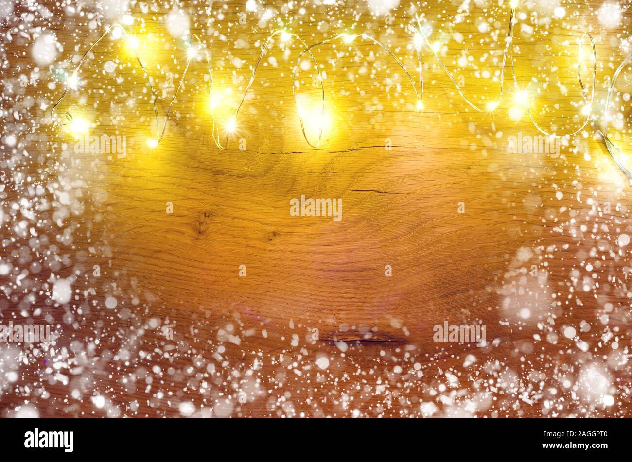 christmas background with garland light and snow Stock Photo Alamy