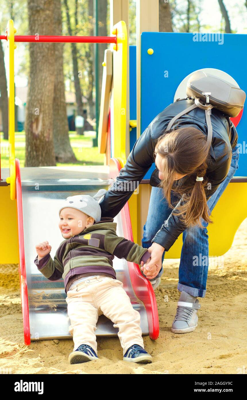 mother and baby at the playground Stock Photo - Alamy