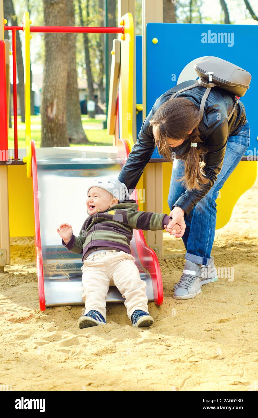 mother and baby at the playground Stock Photo - Alamy