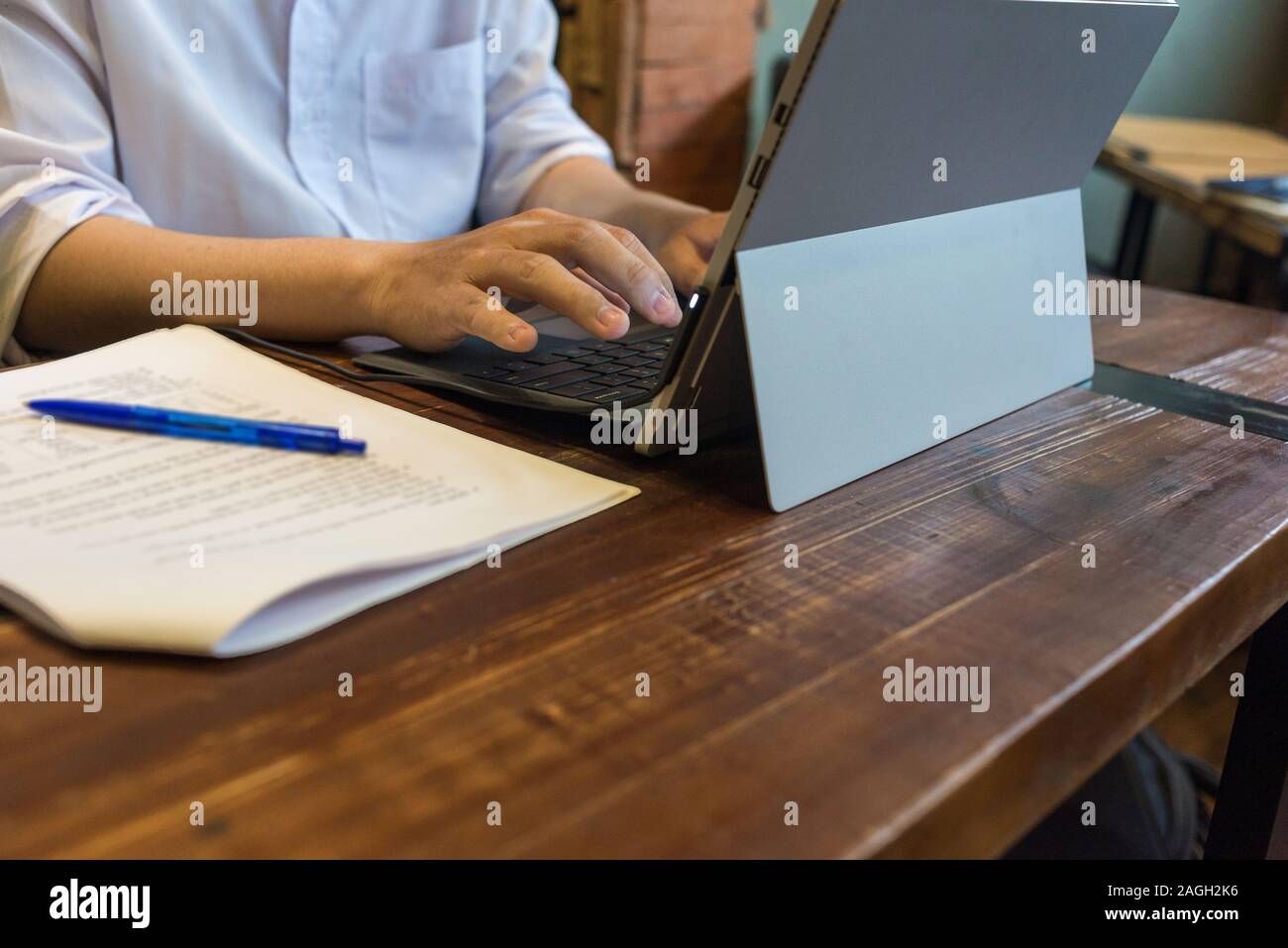 Close up hands holding typing hi-res stock photography and images - Alamy