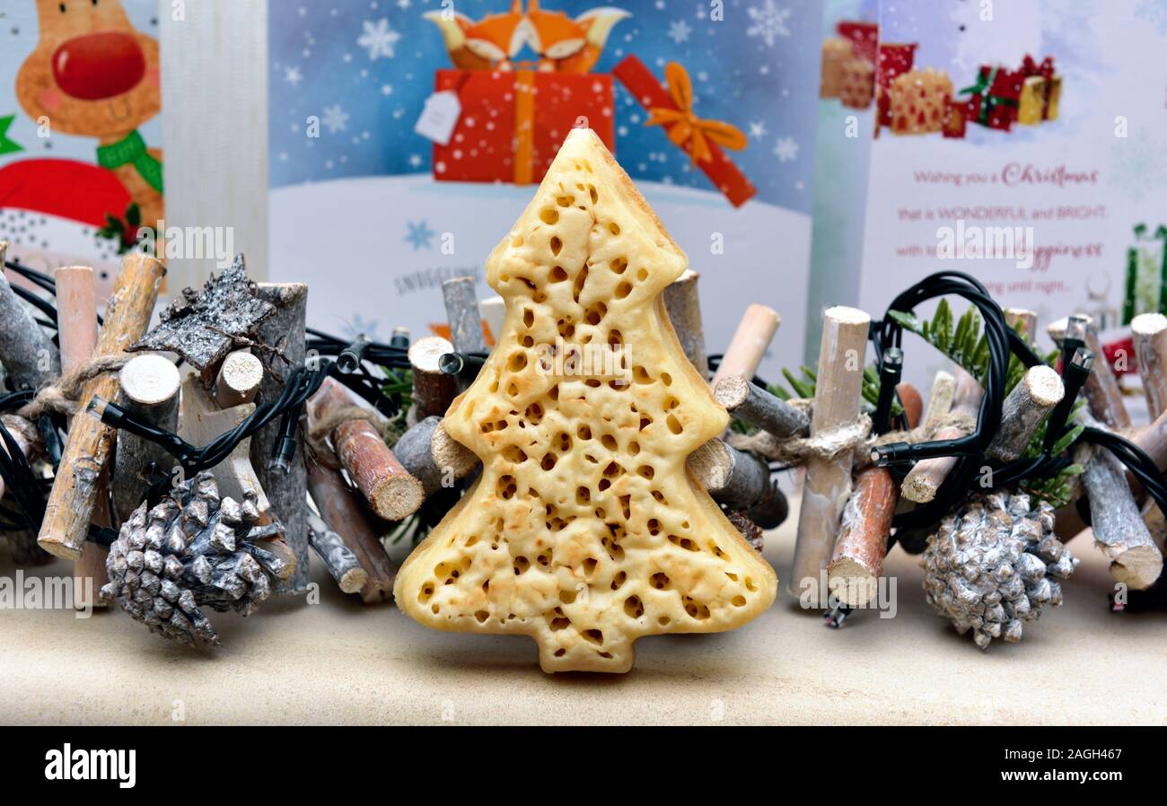 A tree shaped crumpet on a festive background Stock Photo Alamy