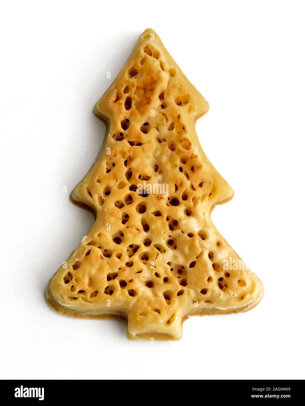 A tree shaped crumpet on a white background Stock Photo
