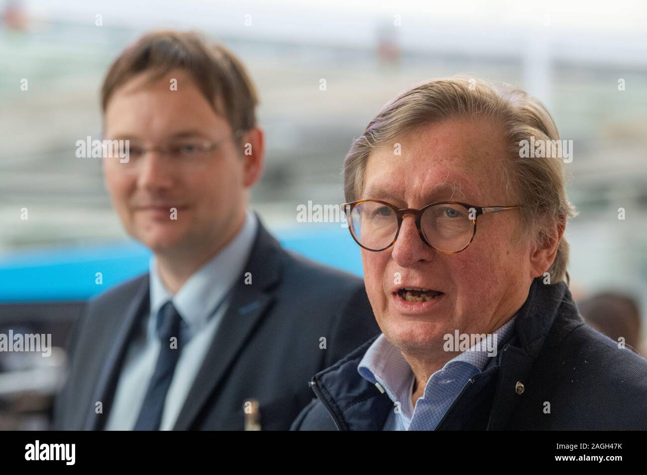 Munich, Germany. 19th Dec, 2019. Hans Reichhart (l, CSU), Minister of Transport of Bavaria, and Michael Kerkloh, Munich Airport CEO, attend the press conference. Transportation Minister Reichhart, (CSU) announced the first test results of the newly installed safety system in a press conference. Credit: Lino Mirgeler/dpa/Alamy Live News Stock Photo