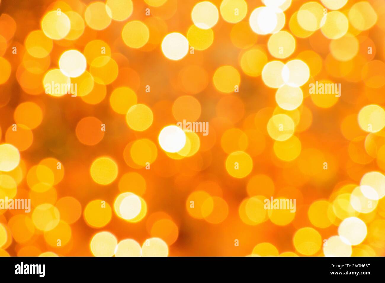 Glittering background of yellow bokeh effect lights - a nice picture for  wallpapers Stock Photo - Alamy
