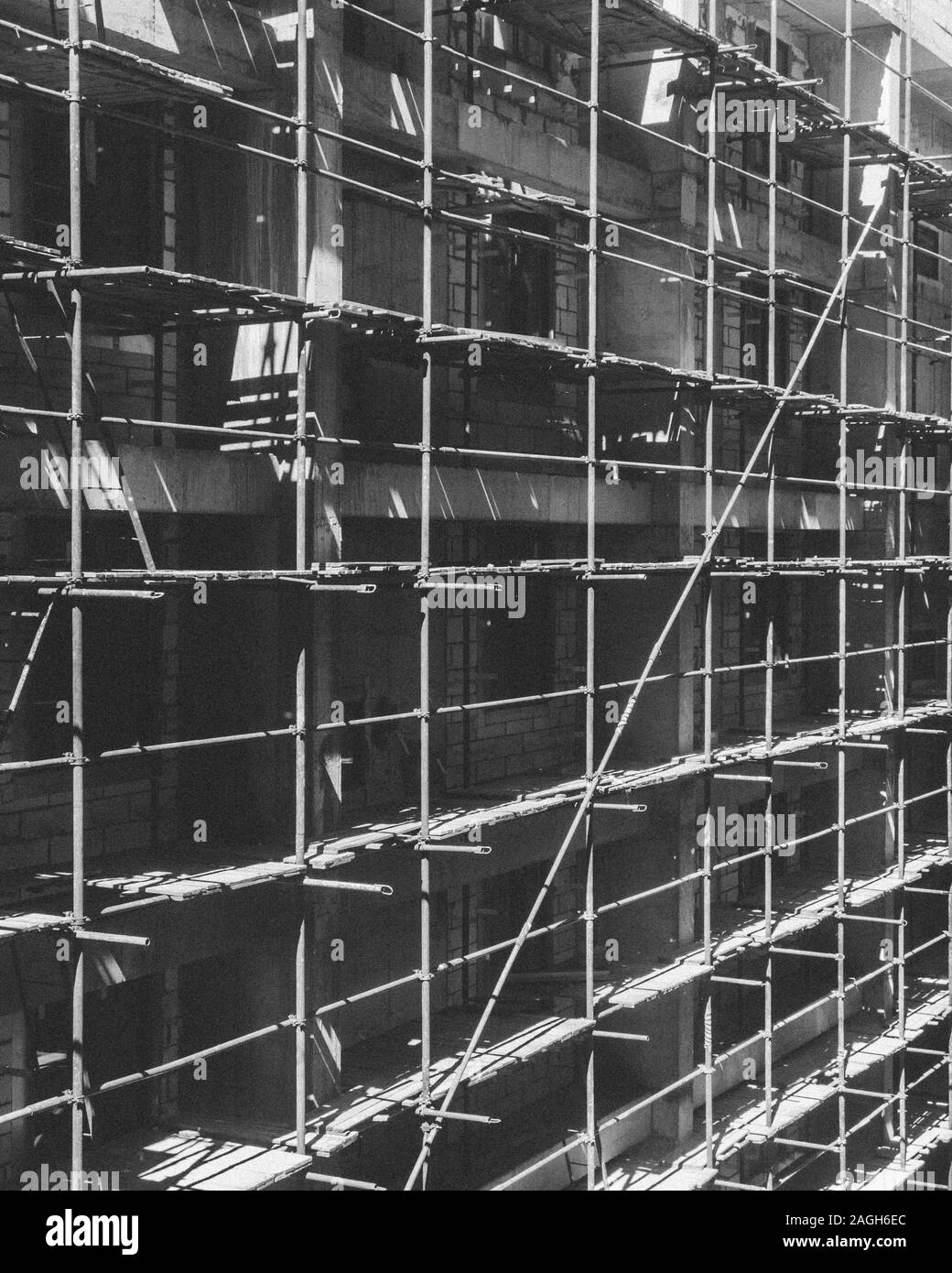 Grayscale vertical shot of a construction site Stock Photo - Alamy