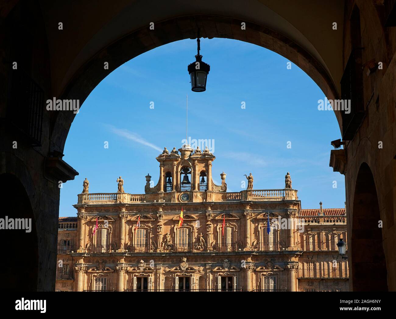 Top of the town hall of the Plaza Mayor in Salamanca through arch Stock