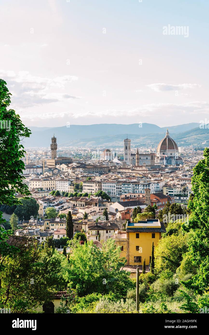 Many beautiful roofs of houses in the historic European city of Italy. Stock Photo