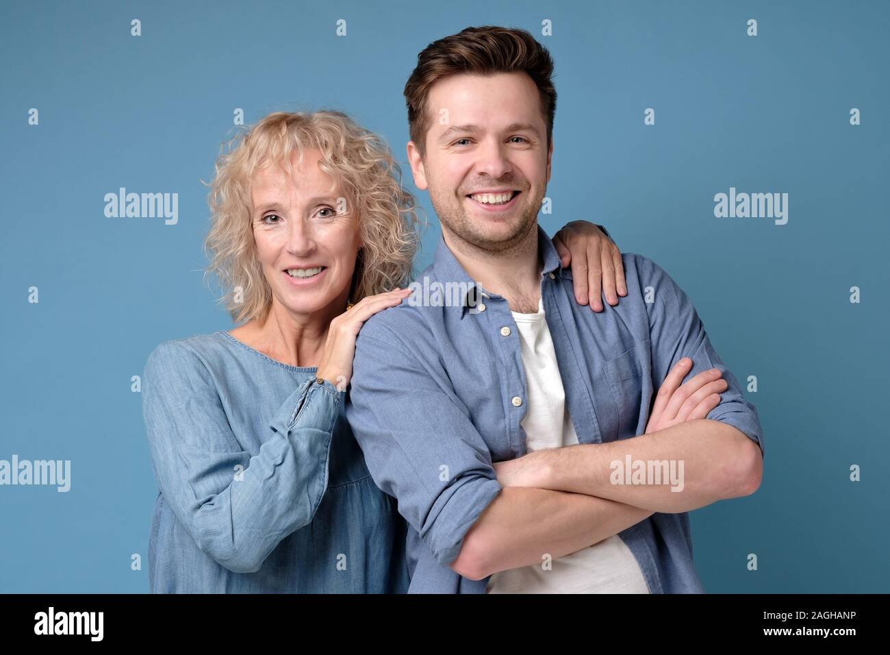 Two mature man and woman looking confident at camera Stock Photo