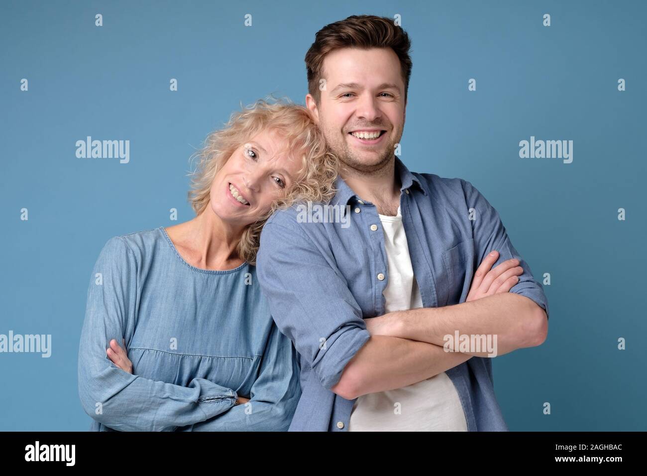 Two mature man and woman looking confident at camera Stock Photo