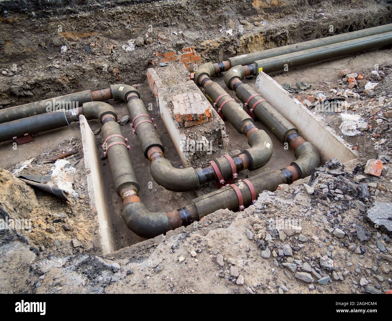 New water pipes laid in bend to compensate for thermal expansion Stock