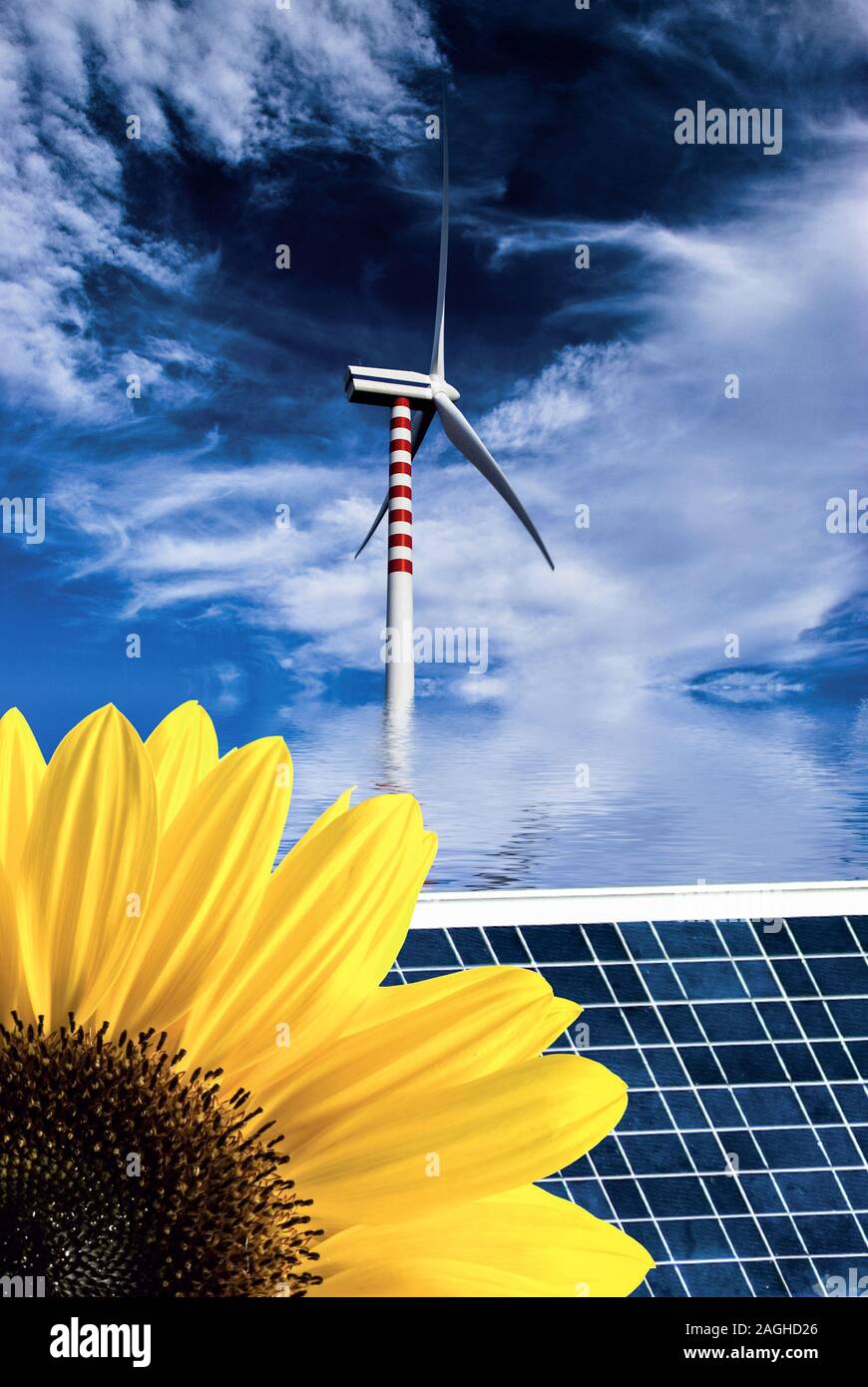 composition with wind generator, a solar panel and a sunflower in the