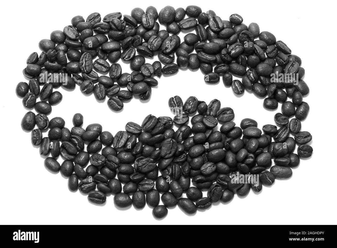 Coffee bean shape created with coffee beans over a white background Stock Photo Alamy