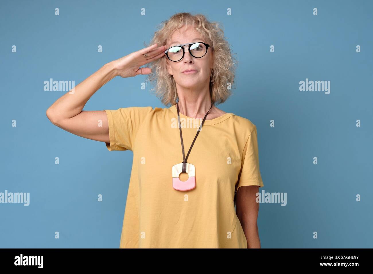. Mature woman is ready to start working. Studio shot Stock Photo