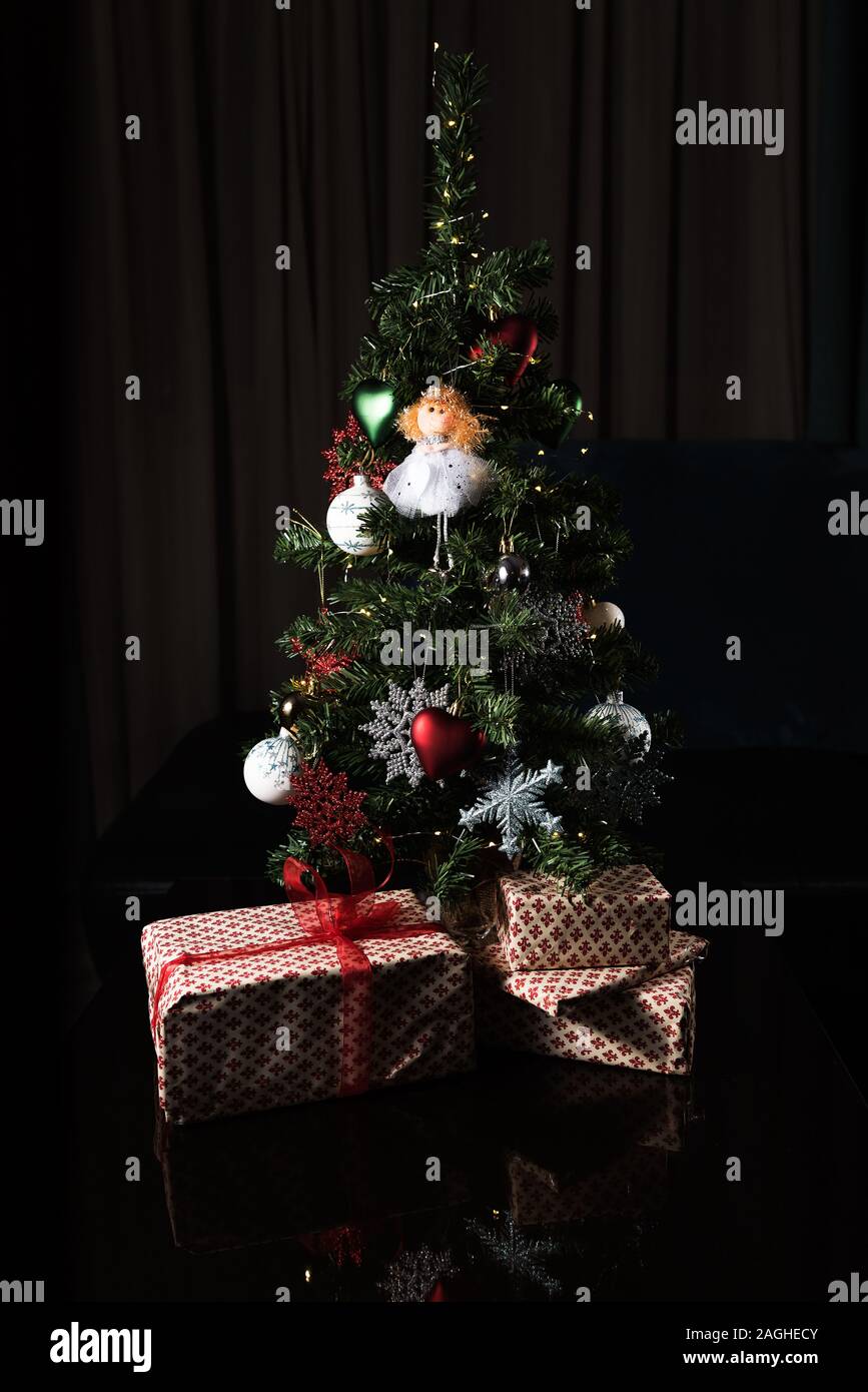 Beautiful Small Decorated Christmas Tree And Many Gifts At Home