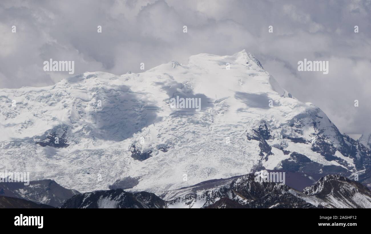 Alpamayo snowy mountain located in Cusco, Peru Stock Photo