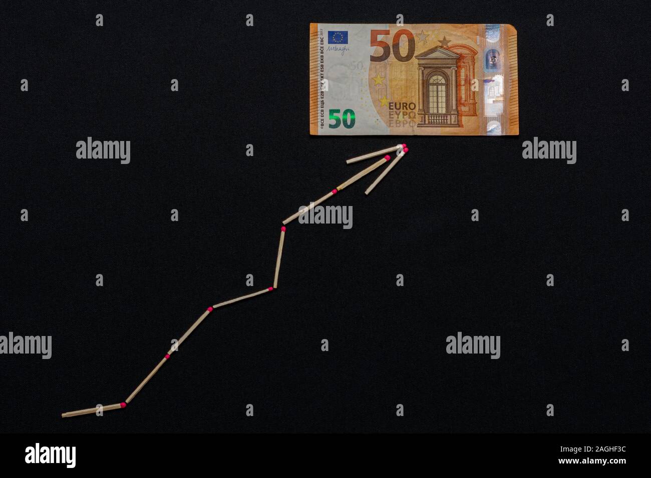 Euro rise and fall graph, banknote on black background Stock Photo Alamy
