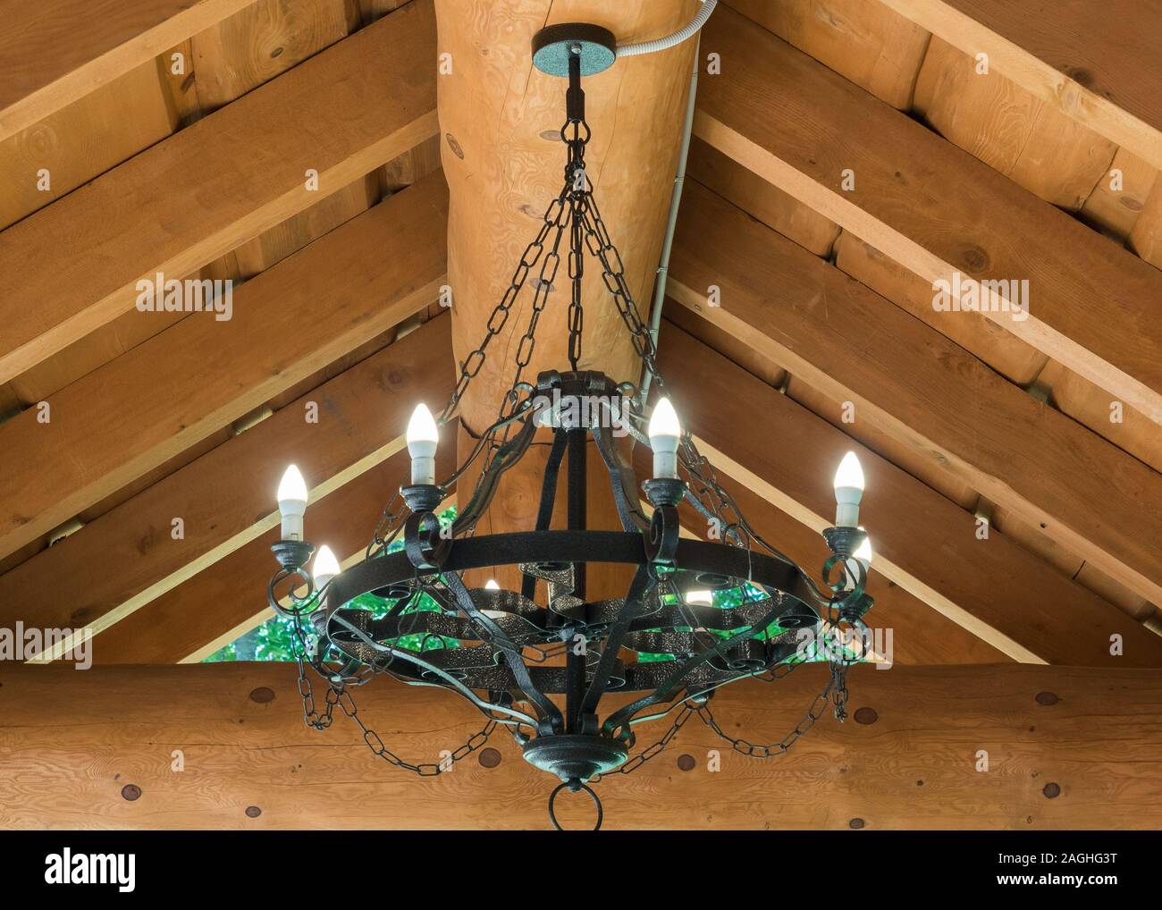 Round Black Wrought Iron Chandelier With Bulbs Weighs In The