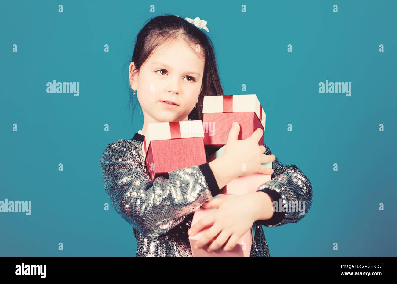Shopping day. Child carry lot gift boxes. Kids fashion. Surprise gift box. Birthday wish list. Special happens every day. Shop for what you want. Girl Stock Photo