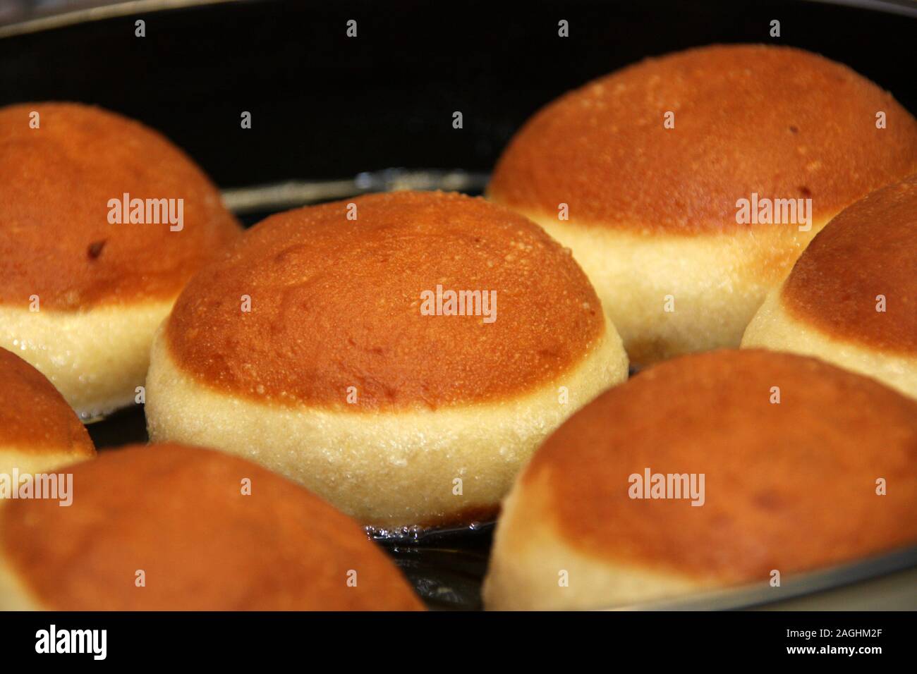 Risen yeast dough baking in pan for making original homemade Austrian ...