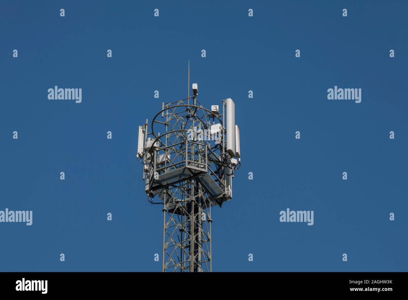 antennas for mobile communication in a cluster on a tower Stock Photo