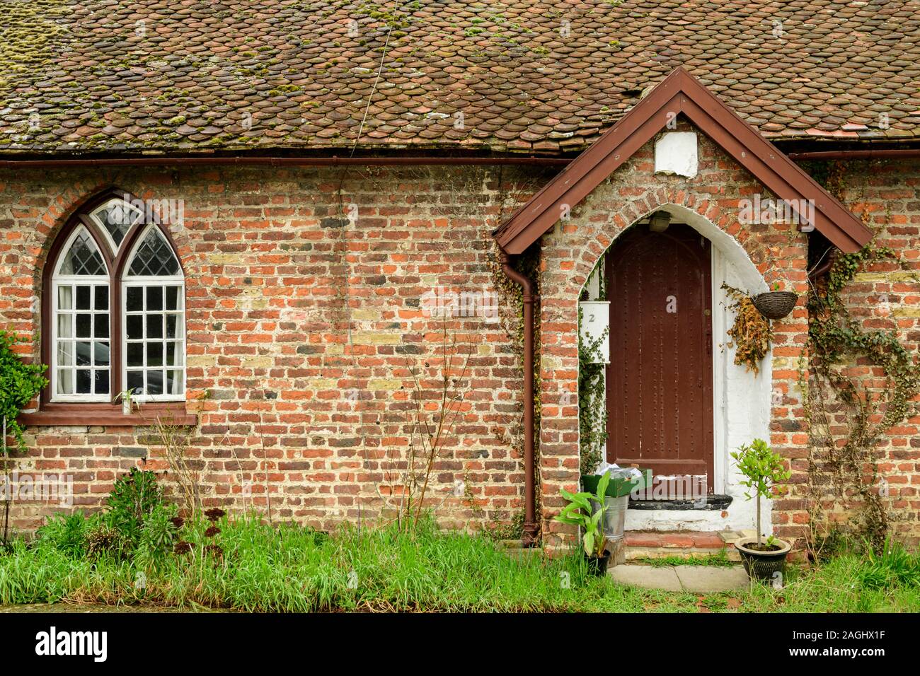 Cottage with front door and window in Grantchester. Stock Photo