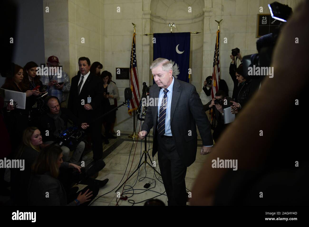 Washington, District of Columbia, USA. 18th Dec, 2019. United States Senator Lindsey Graham (Republican of South Carolina), Chairman, US Senate Judiciary Committee, departs after meeting reporters outside his Capitol Hill office to discuss the impeachment proceedings, the latest news on the FISA process, and to discuss his plans for the committee in 2020 Credit: Ron Sachs/CNP/ZUMA Wire/Alamy Live News Stock Photo