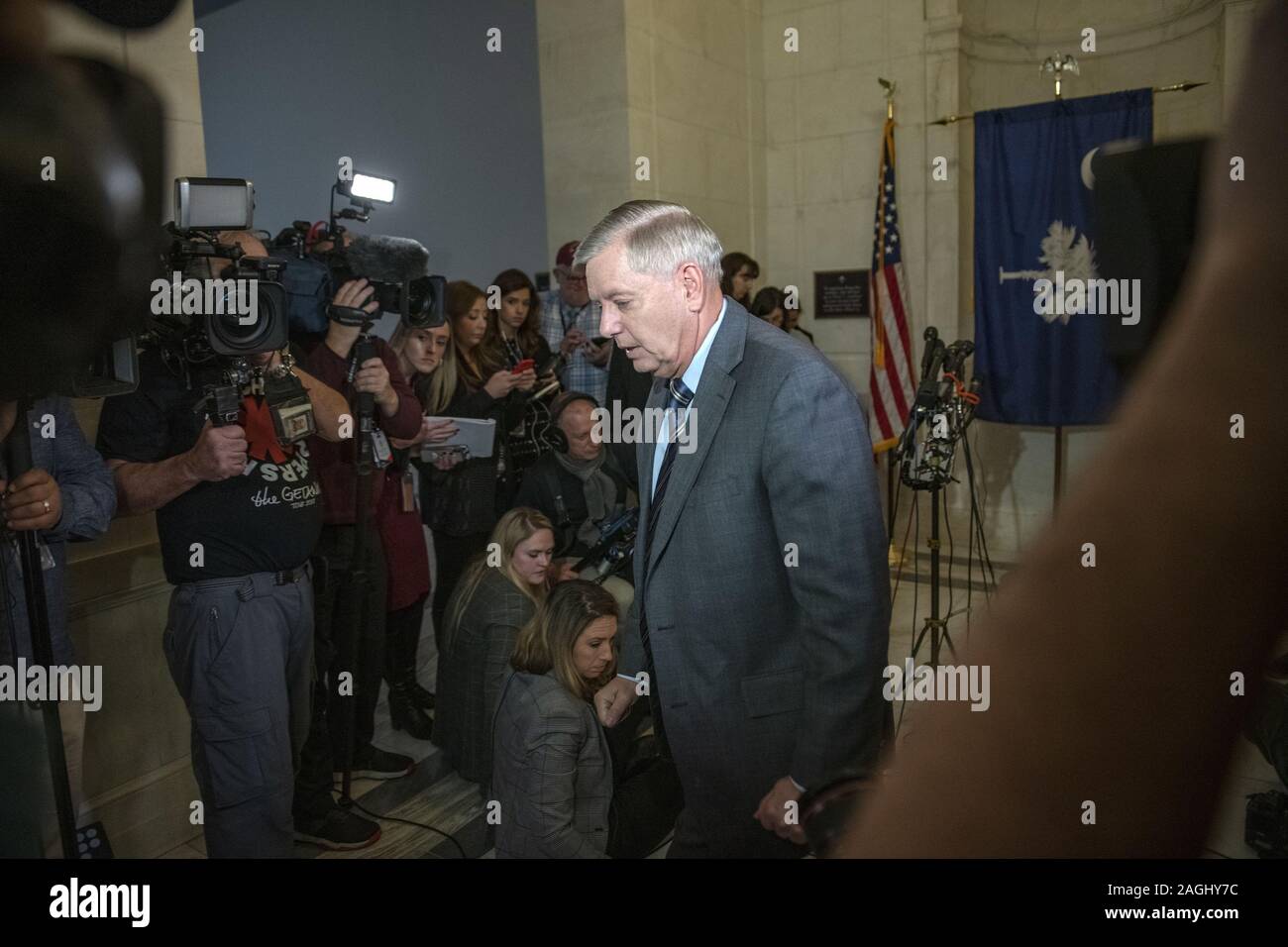 Washington, District of Columbia, USA. 18th Dec, 2019. United States Senator Lindsey Graham (Republican of South Carolina), Chairman, US Senate Judiciary Committee, departs after meeting reporters outside his Capitol Hill office to discuss the impeachment proceedings, the latest news on the FISA process, and to discuss his plans for the committee in 2020 Credit: Ron Sachs/CNP/ZUMA Wire/Alamy Live News Stock Photo