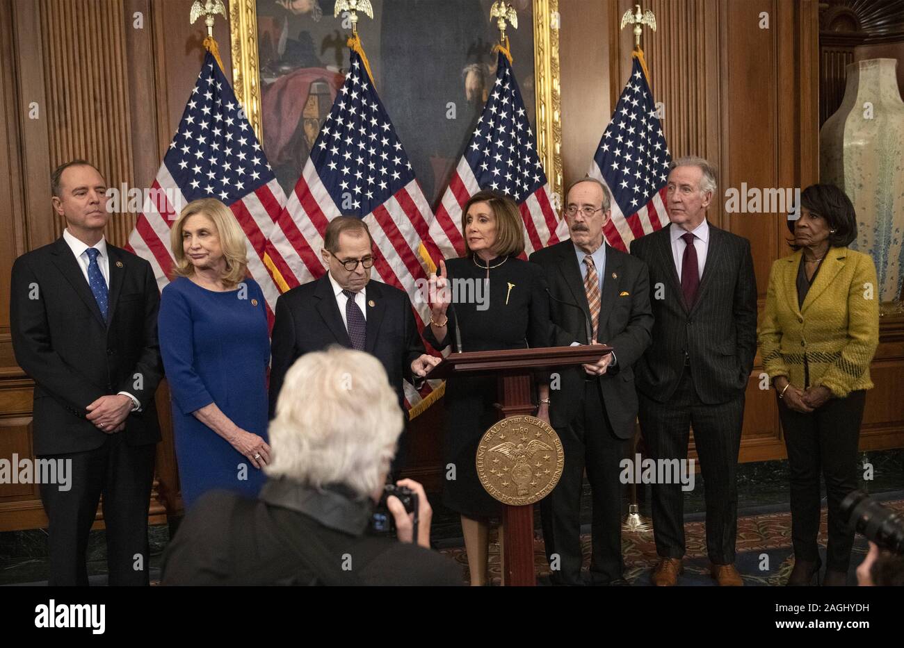 December 18, 2019, Washington, District of Columbia, USA: Speaker of the United States House of Representatives Nancy Pelosi (Democrat of California), center, holds a press conference following the vote on the two articles of impeachment against US President Donald J. Trump in the US Capitol in Washington, DC on Wednesday, December 18, 2019. From left to right: United States Representative Adam Schiff (Democrat of California), Chairman, US House Permanent Select Committee on Intelligence; United States Representative Carolyn Maloney (Democrat of New York), Chair, US House Oversight Committee; Stock Photo