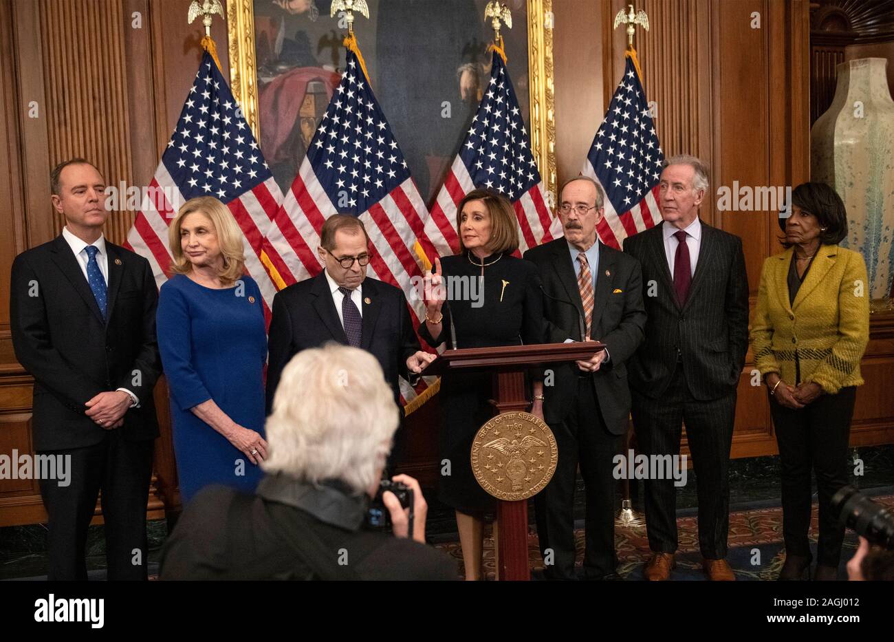 Speaker of the United States House of Representatives Nancy Pelosi (Democrat of California), center, holds a press conference following the vote on the two articles of impeachment against US President Donald J. Trump in the US Capitol in Washington, DC on Wednesday, December 18, 2019. From left to right: United States Representative Adam Schiff (Democrat of California), Chairman, US House Permanent Select Committee on Intelligence; United States Representative Carolyn Maloney (Democrat of New York), Chair, US House Oversight Committee; United States Representative Jerrold Nadler (Democrat of Stock Photo