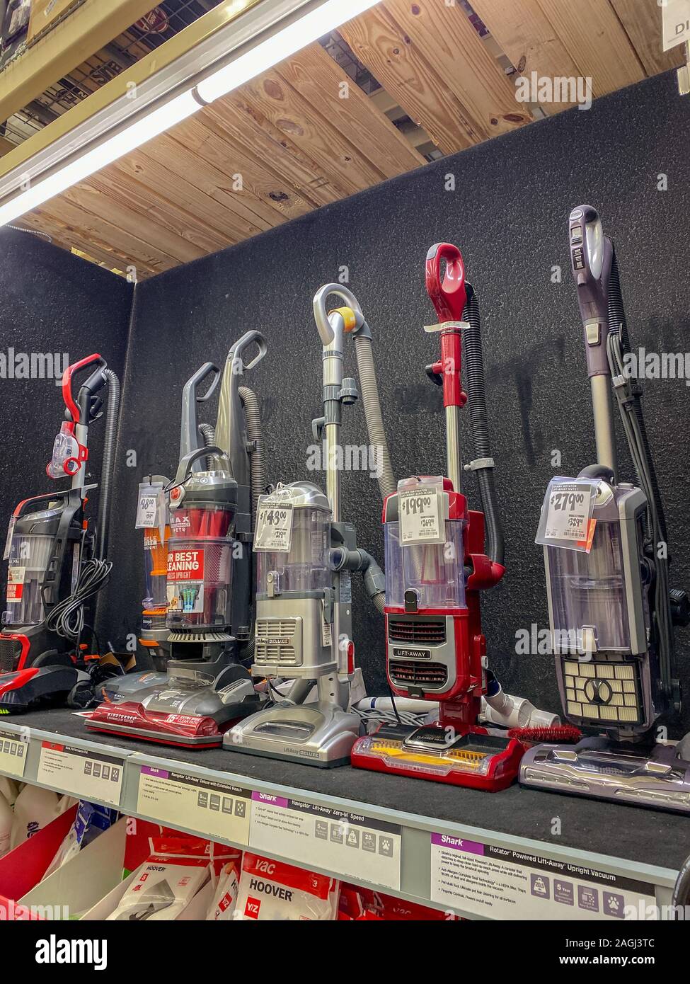 Orlando,FL/USA-11/11/19: A display shelf of vacuums for sale at a Home Depot store. Stock Photo