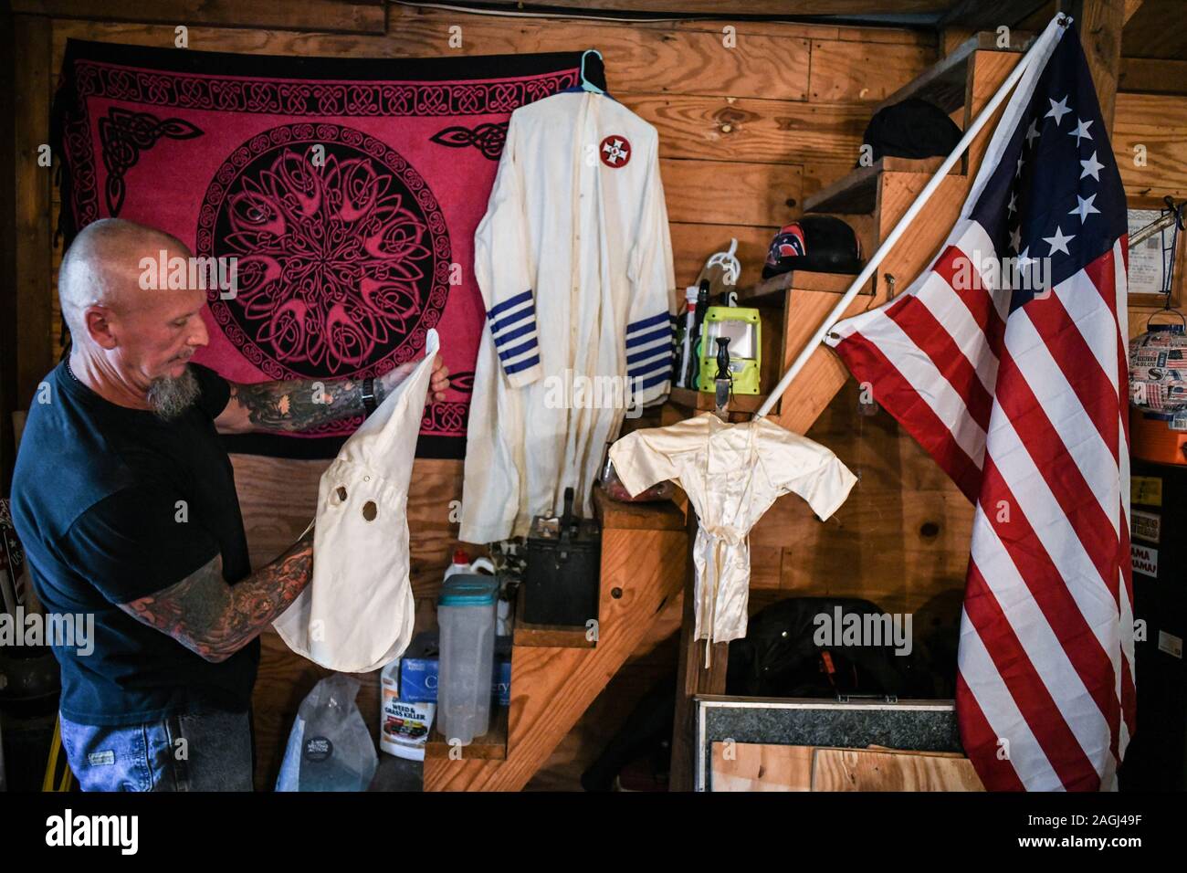 Dahlonega, Georgia, USA. 18th Sep, 2019. CHESTER DOLES shows his old Imperial Wizard, Ku Klux Klan hood and gown. He calls the Klan 'one of the most American organizations in the country and one of the oldest. And I guess even Klansman can get older and wiser. I mean we have Robert Byrd the Senator (from West Virginia) who was a Democrat and served as a full member of the Klan.' Credit: Miguel Juarez Lugo/ZUMA Wire/Alamy Live News Stock Photo