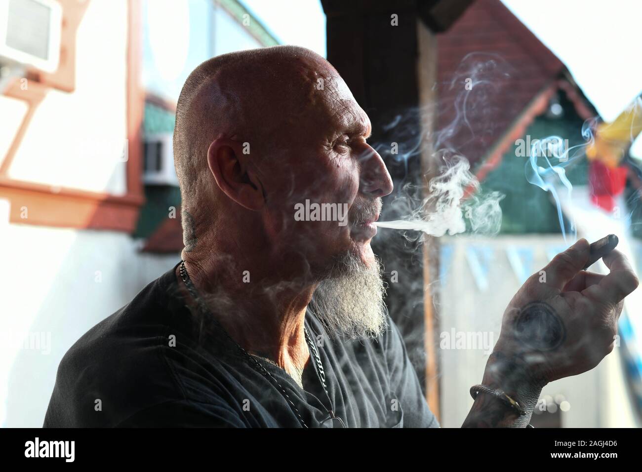 Helena, Georgia, USA. 15th Sep, 2019. CHESTER DOLES, a self-declared white nationalist who said he shares 95 percent of Trump's agenda, smokes a cigarette in Helena, a Bavarian tourist town popular with exiled-Nazis in the 1950s and more recently, Doles and his colleagues. Credit: Miguel Juarez Lugo/ZUMA Wire/Alamy Live News Stock Photo