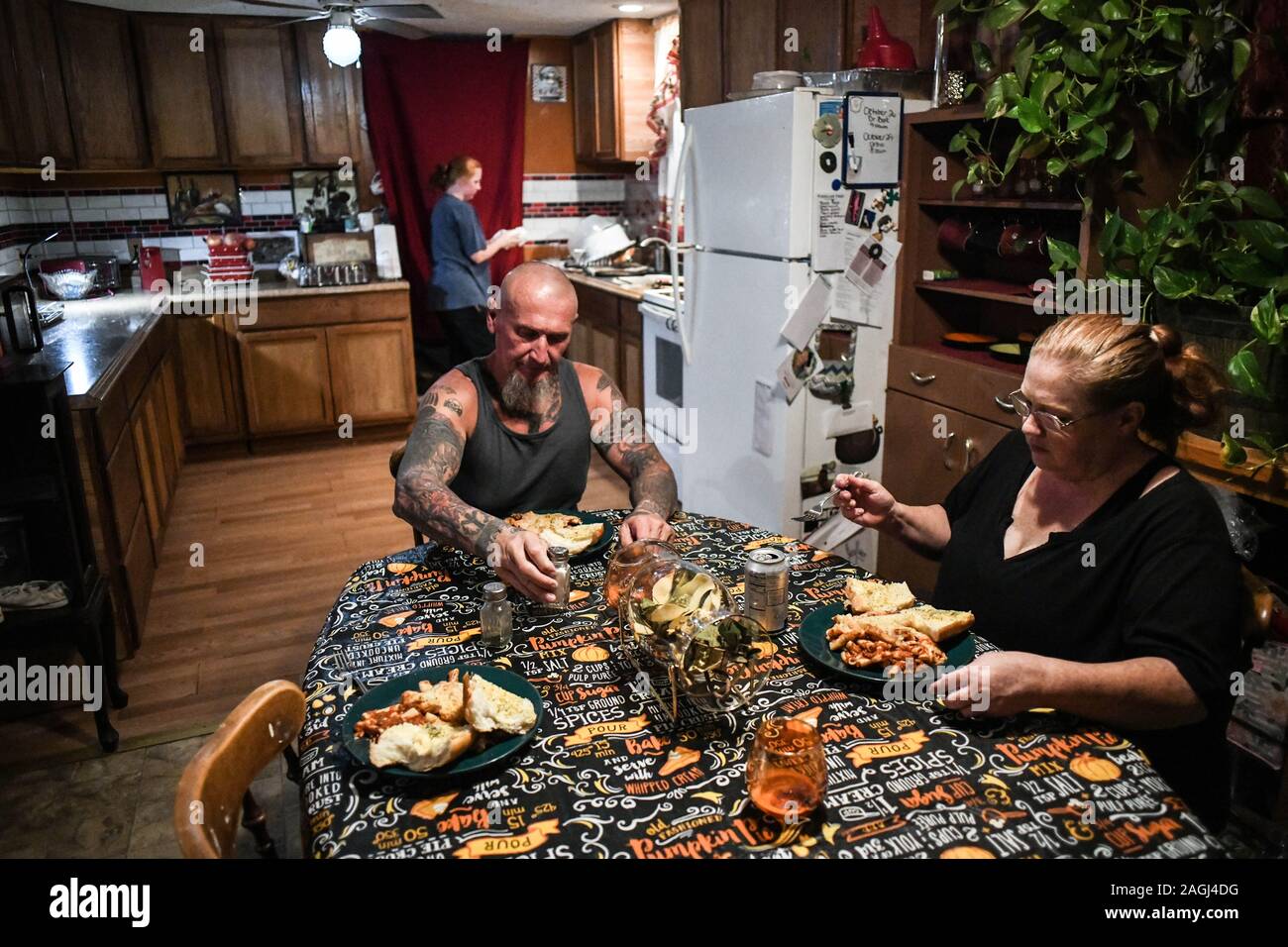 Dahlonega, Georgia, USA. 17th Sep, 2019. CHESTER DOLES and his wife eat dinner, which often includes Lasagna, Chinese food and Mexican meals. He said that he has mellowed a bit since he's gotten older but his essential views about what he calls 'the white race' have not changed: 'We are definitely becoming a minority in our own country, and that is even more of a reason that we should stand up now, as American Patriots coast to coast, and hang on to our way of life and our culture, which includes everyoneâ It's not limited to race.' Credit: Miguel Juarez Lugo/ZUMA Wire/Alamy Live News Stock Photo