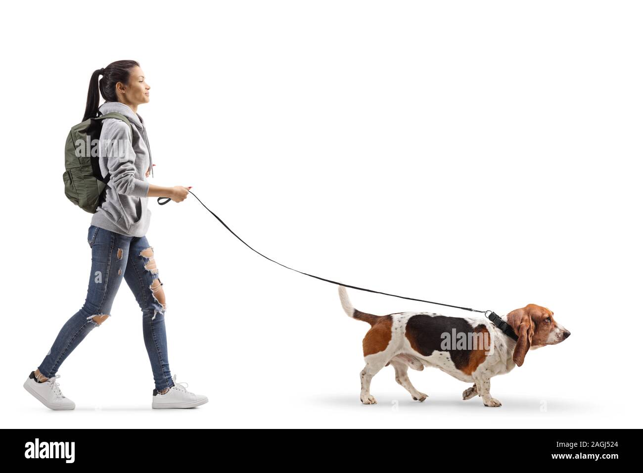 Teen girl walking dog hi-res stock photography and images - Alamy
