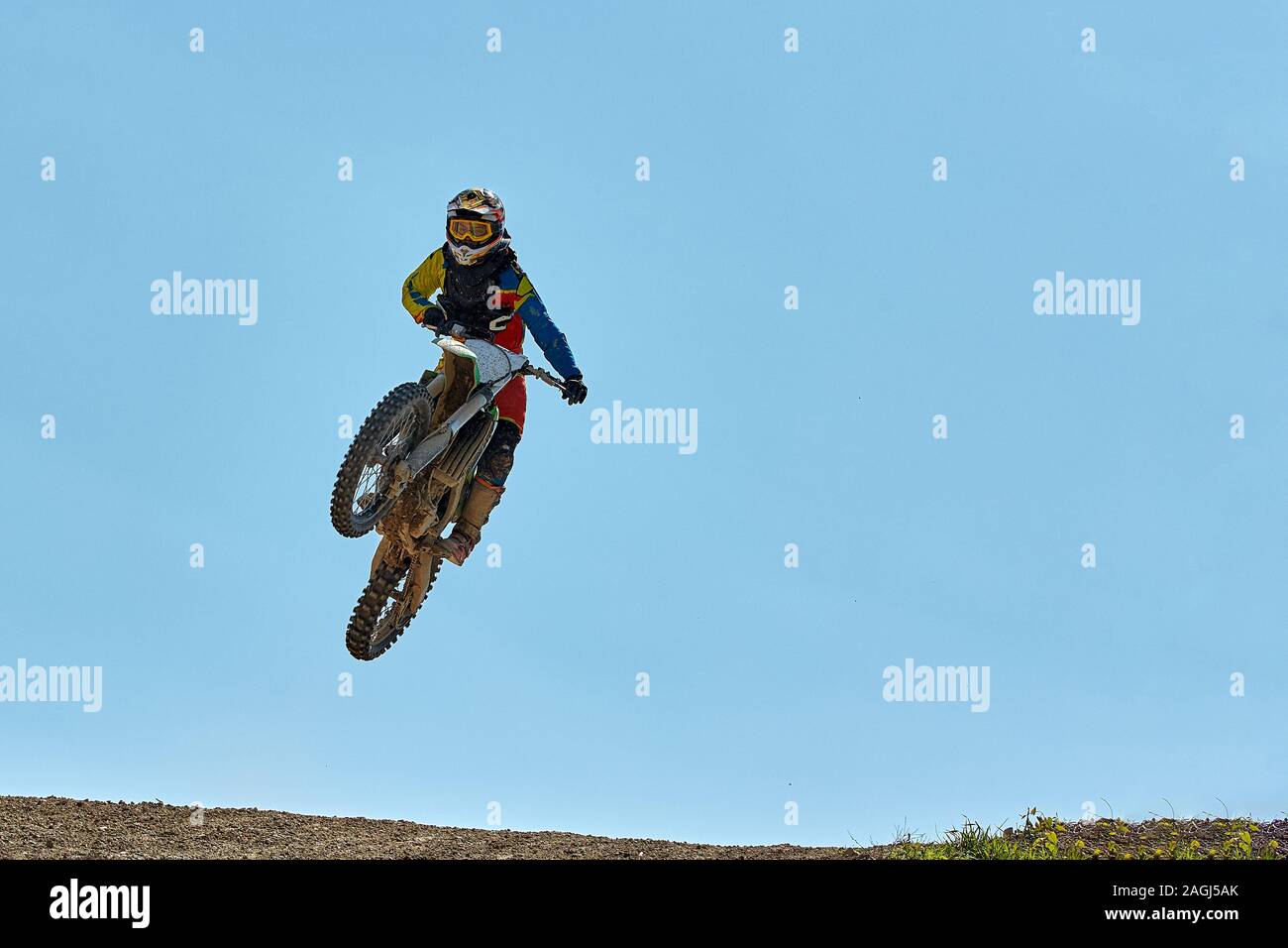 Extreme sports, motorcycle jumping. Motorcyclist makes an extreme jump ...
