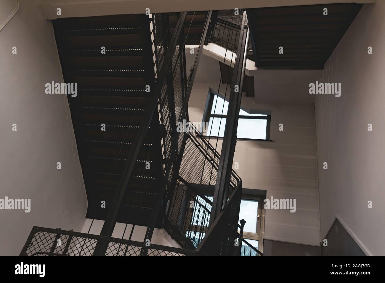 Old iron stairs and windows Stock Photo