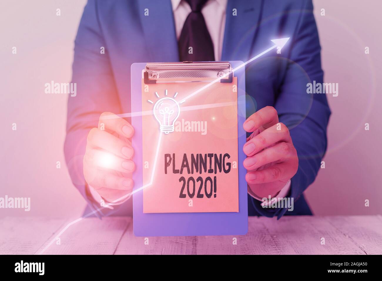 Writing note showing Planning 2020. Business concept for process of ...