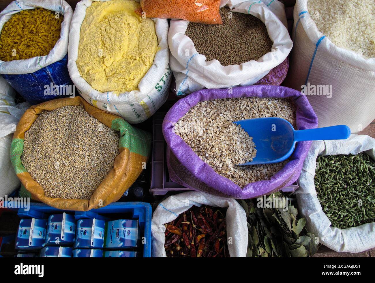 Colorful bags of grain and meal in an outdoor market in Casablanca, Morocco. Stock Photo
