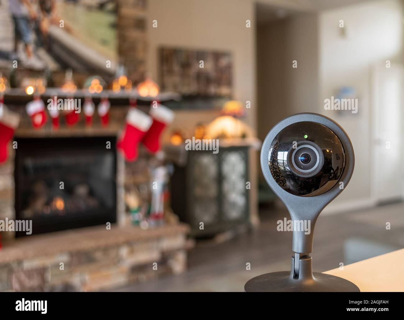 A Security Camera With The Light On In Front Of An Interior