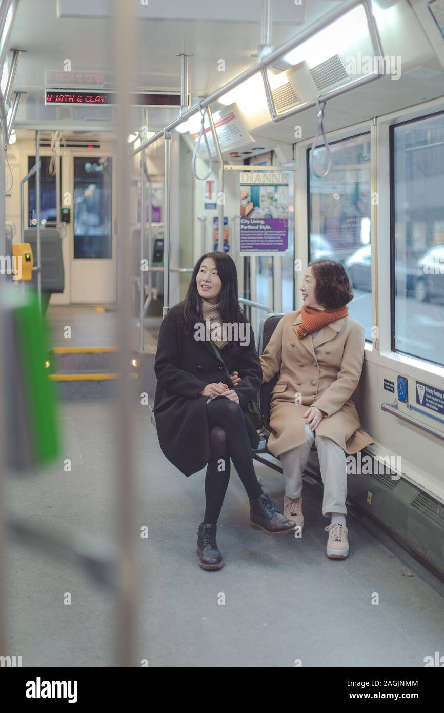 Portland, Oregon Dec 15, 2019 Happy asian elderly mother and adult