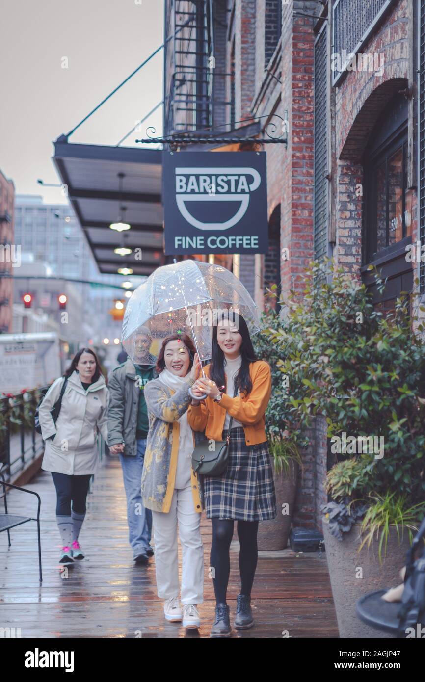Portland, Oregon Dec 15, 2019 Happy asian elderly mother and adult