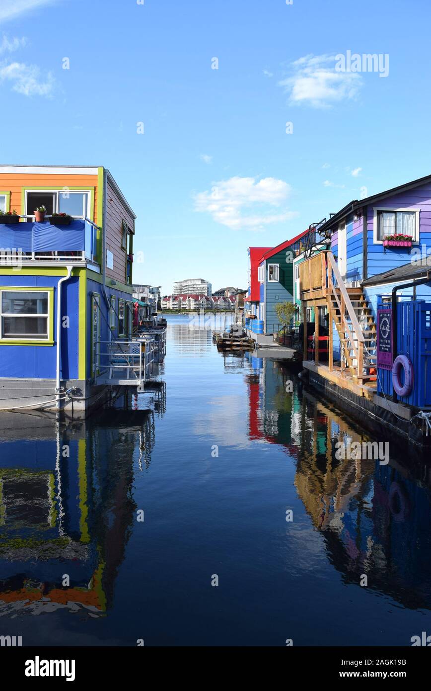 Houseboats and small docked boats in Victoria, British Columbia. Stock Photo