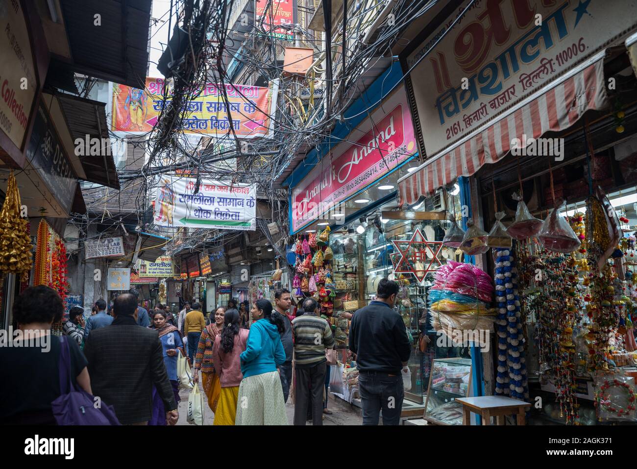 Delhi, India - December 14, 2019: Crowded Chandi Chowk market in Old Delhi, people shopping for wedding attire and decorations in the market Stock Photo